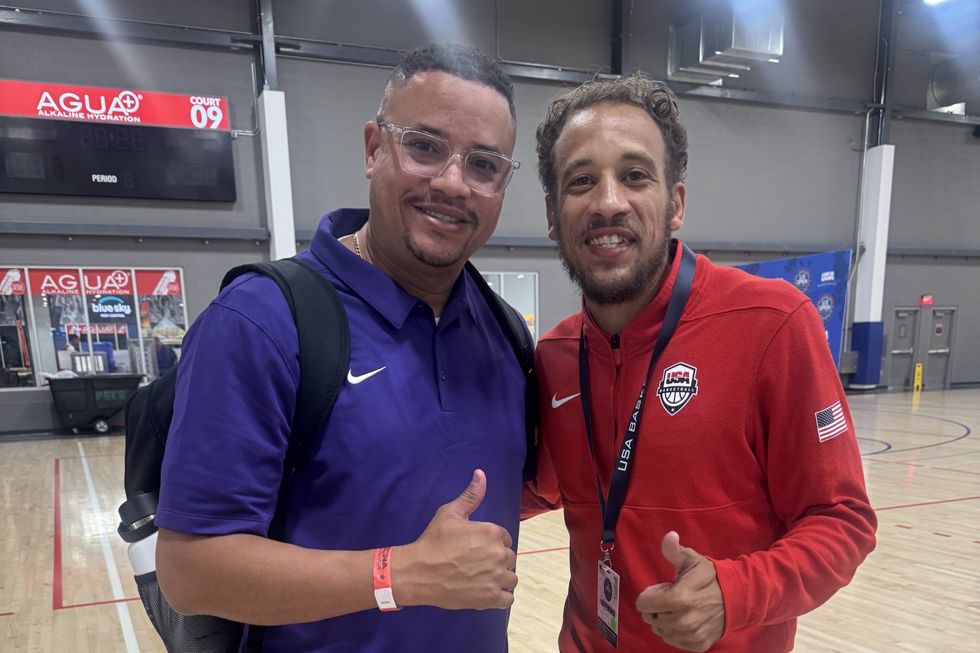 Coach Fish with a USA Basketball staff member at a tournament